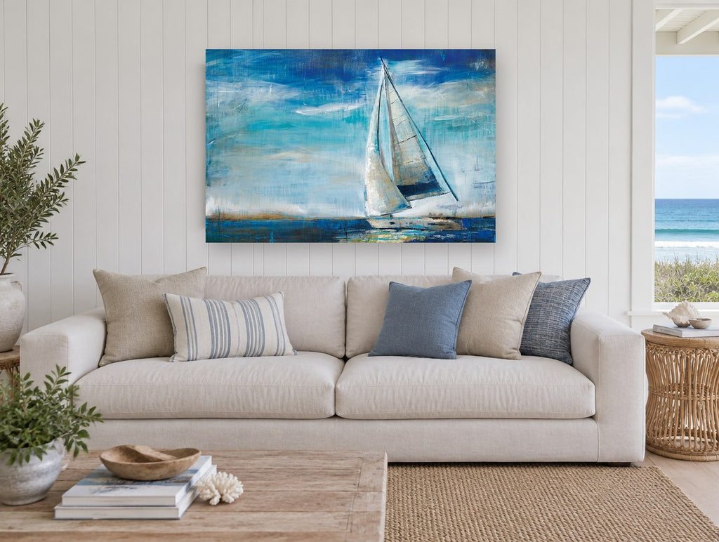 Sails Into Blue coastal canvas print on the wall of a beach house living room
