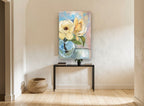 Cream Magnolia in Glass floral canvas print on the wall of a hallway