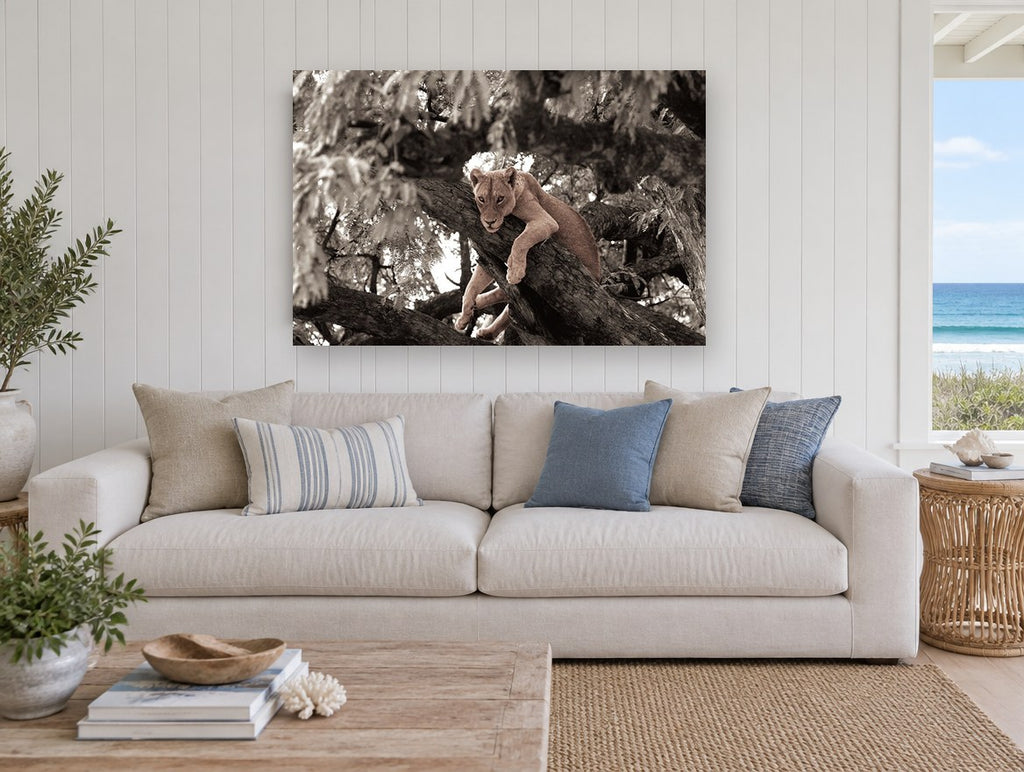 Lioness in the Branches floral canvas print on the wall of a beach house living room