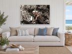 Lioness in the Branches floral canvas print on the wall of a beach house living room