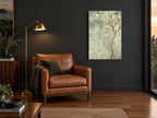White Blossom Mist floral canvas print on the wall of a charcoal living room