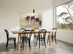 Violet Orchid Drift floral canvas print on the wall of a dining room