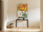 Overflowing Poppy Vase floral canvas print on the wall of a hallway