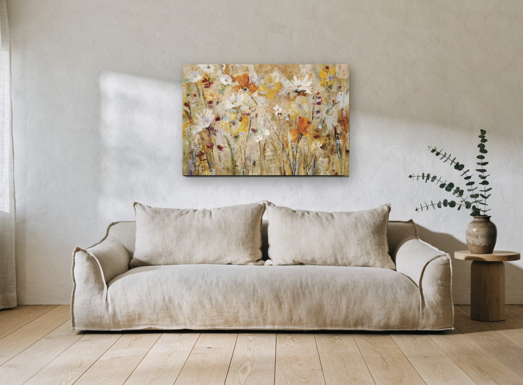 Golden Meadow Drift floral canvas print on the wall of a living room