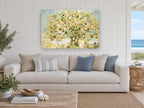 Circle Leaf Tree floral canvas print on the wall of a beach house living room