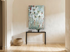 Meadow Mist Blooms floral canvas print on the wall of a hallway