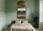 Sails at Dusk coastal canvas print on the wall of a bedroom