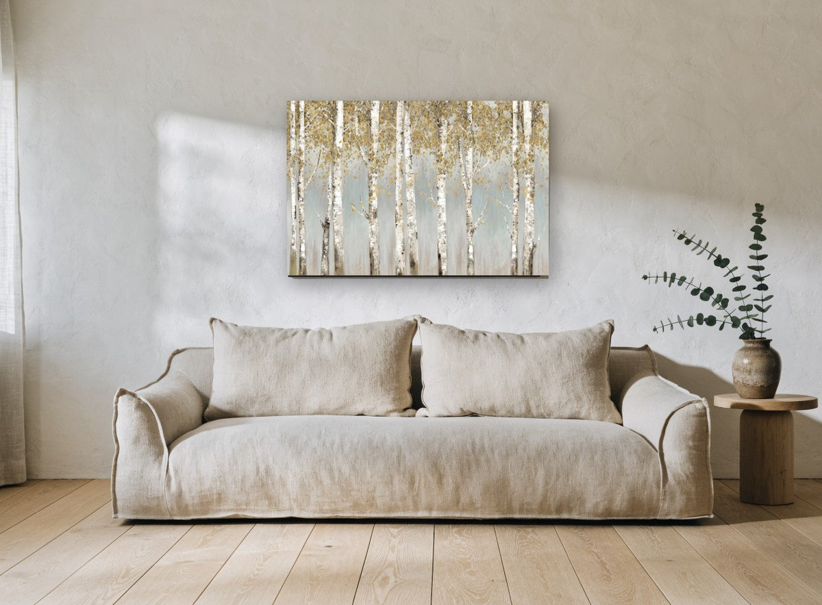 Golden Birch Haze floral canvas print on the wall of a living room