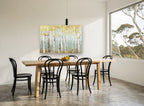 Misty Teal Birch Haze floral canvas print on the wall of a dining room