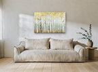 Misty Teal Birch Haze floral canvas print on the wall of a living room