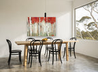 Crimson Birch Grove floral canvas print on the wall of a dining room
