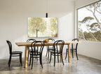 Golden Leaf Fall floral canvas print on the wall of a dining room