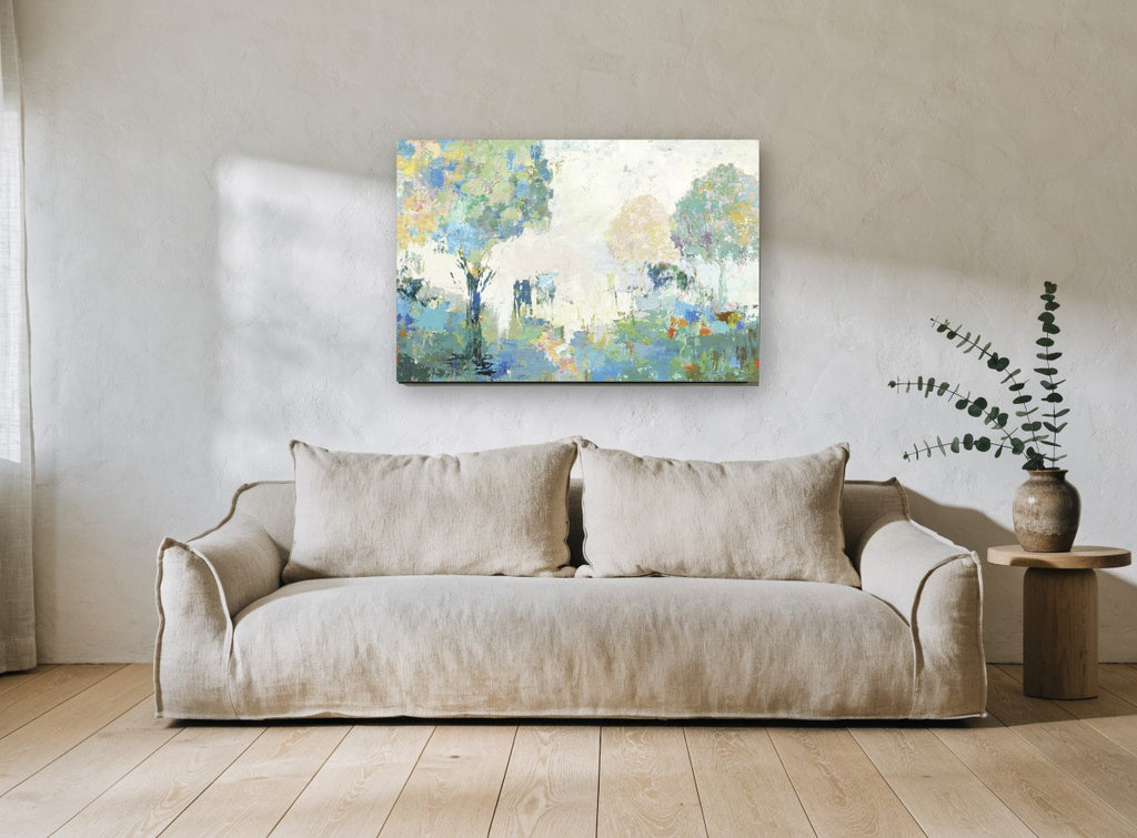 Misty Orchard Light floral canvas print on the wall of a living room
