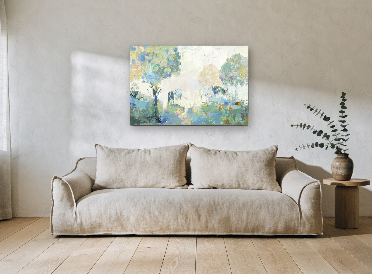 Misty Orchard Light floral canvas print on the wall of a living room