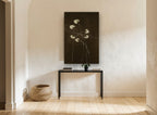 Pale Blooms at Night floral canvas print on the wall of a hallway