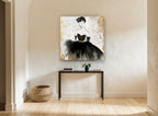 Lady in Newsprint Black vintage canvas print on the wall of a hallway