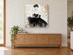 Lady in Newsprint Black vintage canvas print on the wall of a living room above a sideboard