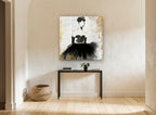 Lady in Black Newsprint vintage canvas print on the wall of a hallway