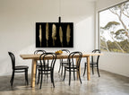 Five Gold Quills animal canvas print on the wall of a dining room