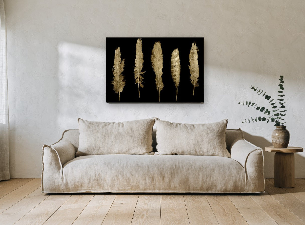 Five Gilded Feathers animal canvas print on the wall of a living room