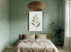 Green Sprig on Grey floral canvas print on the wall of a bedroom