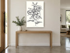 Graphite Hibiscus Study floral canvas print on the wall of a entry hall