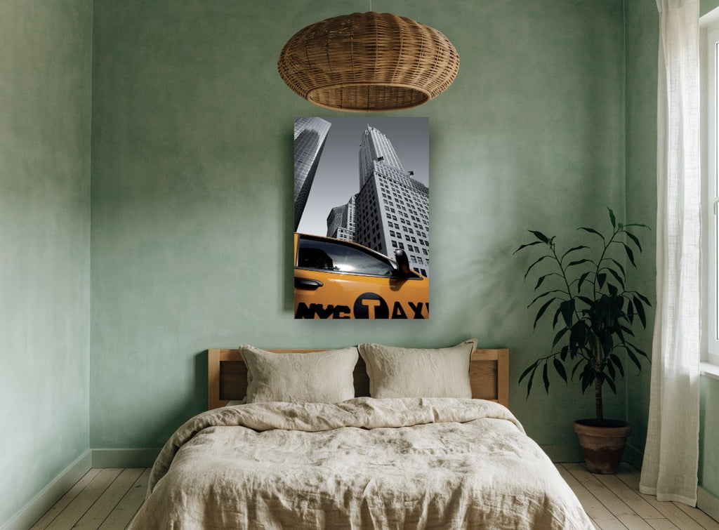 Yellow Cab Below Chrysler city canvas print on the wall of a bedroom