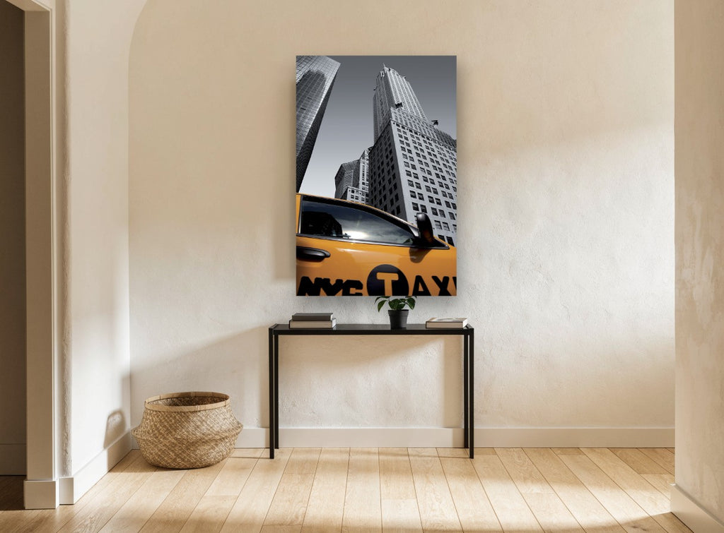 Yellow Cab Below Chrysler city canvas print on the wall of a hallway