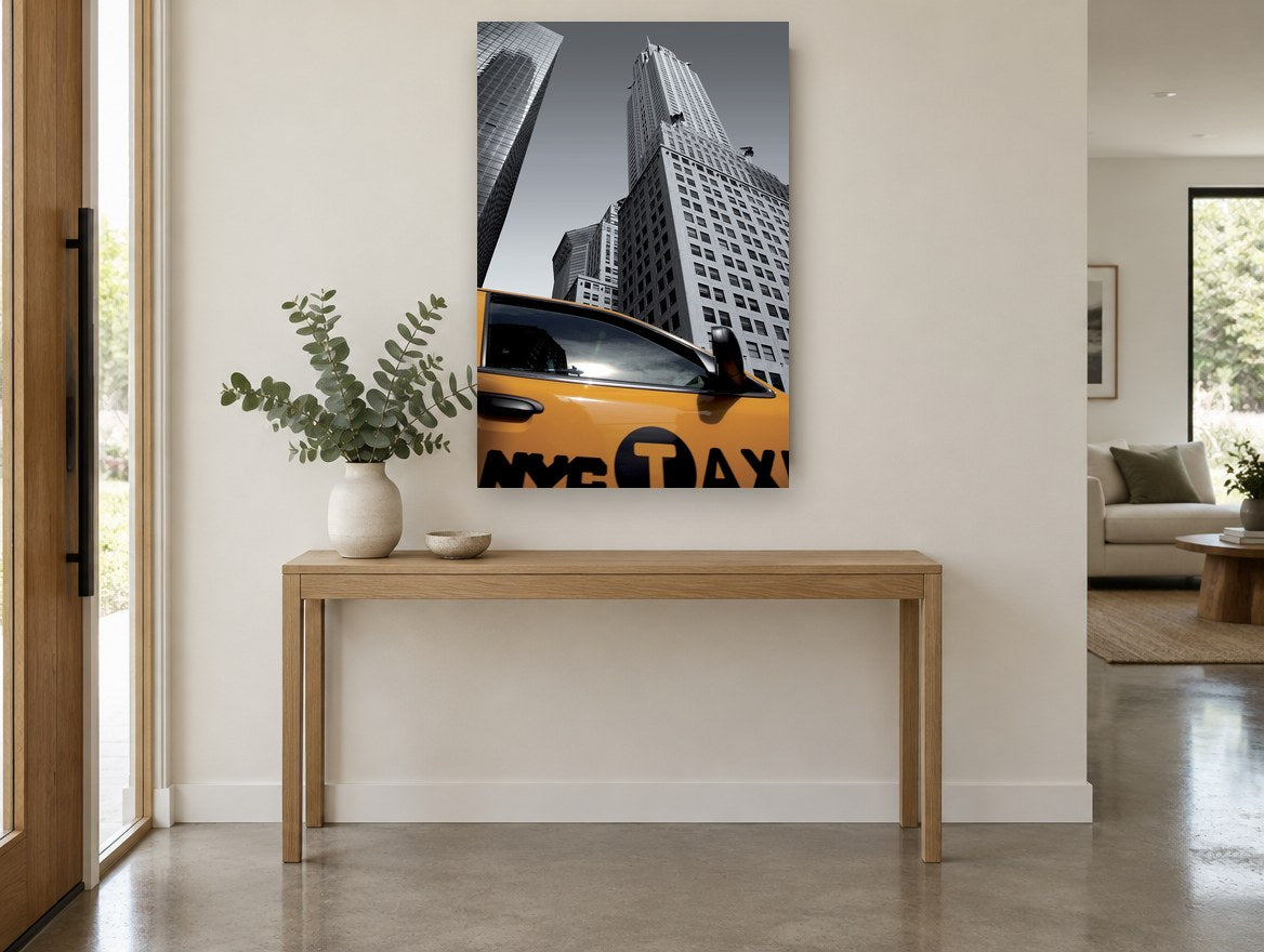 Yellow Cab Below Chrysler city canvas print on the wall of a entry hall