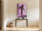 Magenta Blooms in Tall Vase floral canvas print on the wall of a hallway