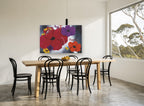 Poppy Chorus floral canvas print on the wall of a dining room