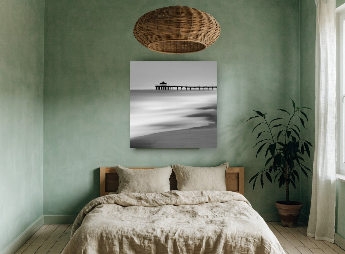 Silent Pier Haze coastal canvas print on the wall of a bedroom