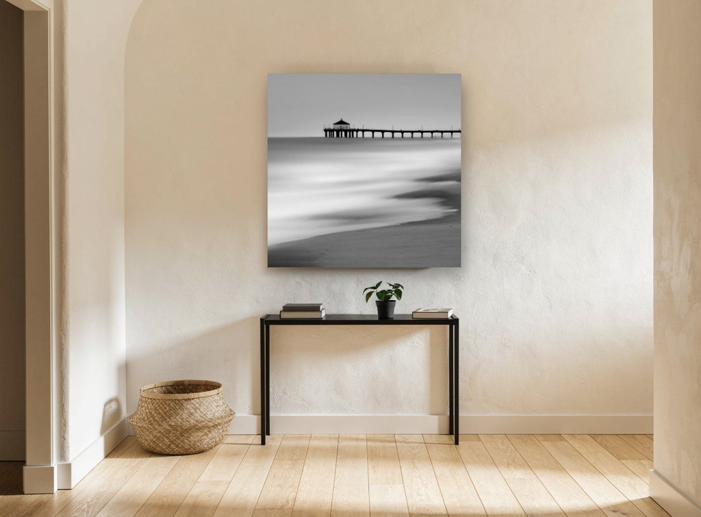 Silent Pier Haze coastal canvas print on the wall of a hallway