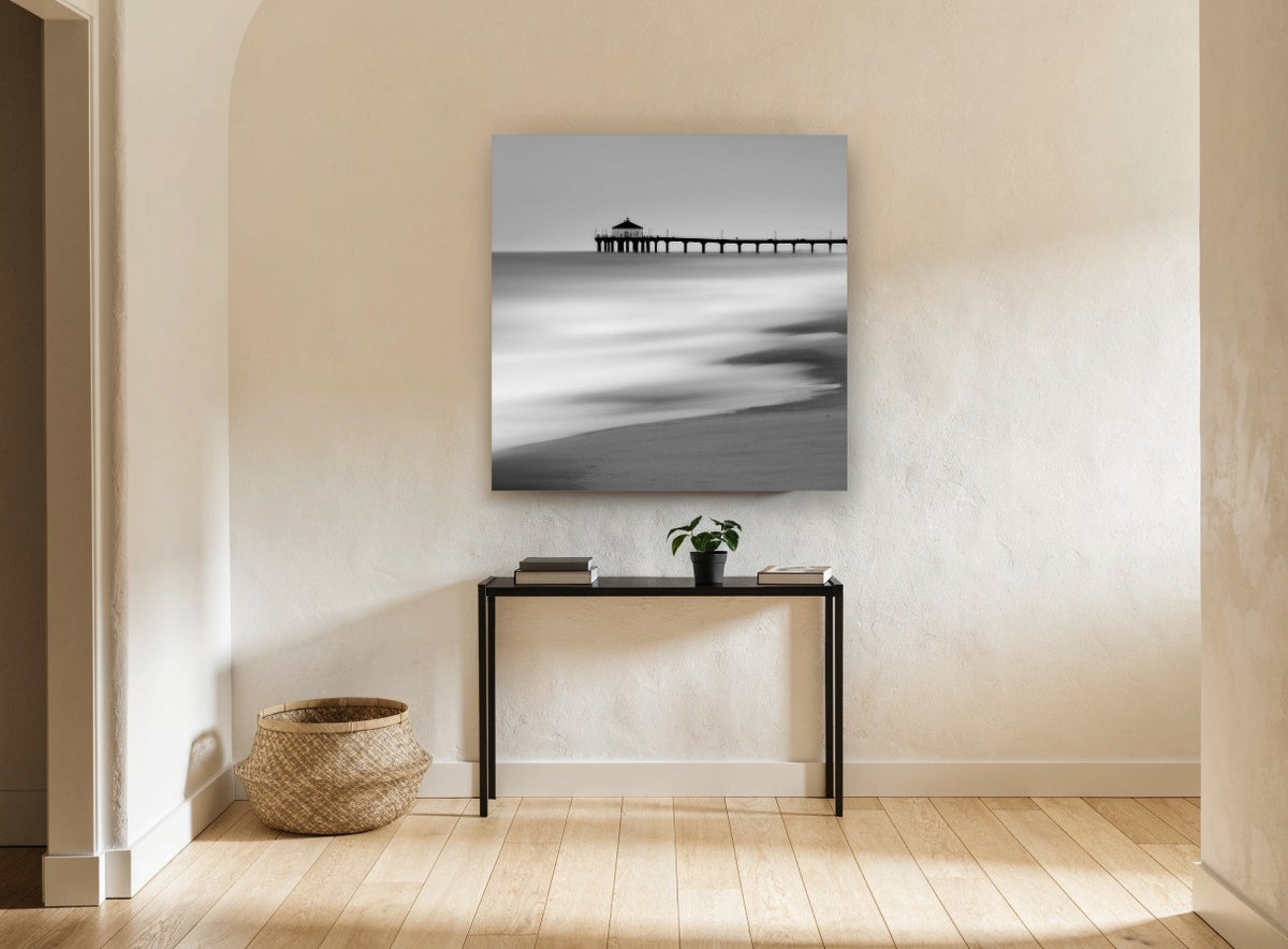 Silent Pier Haze coastal canvas print on the wall of a hallway