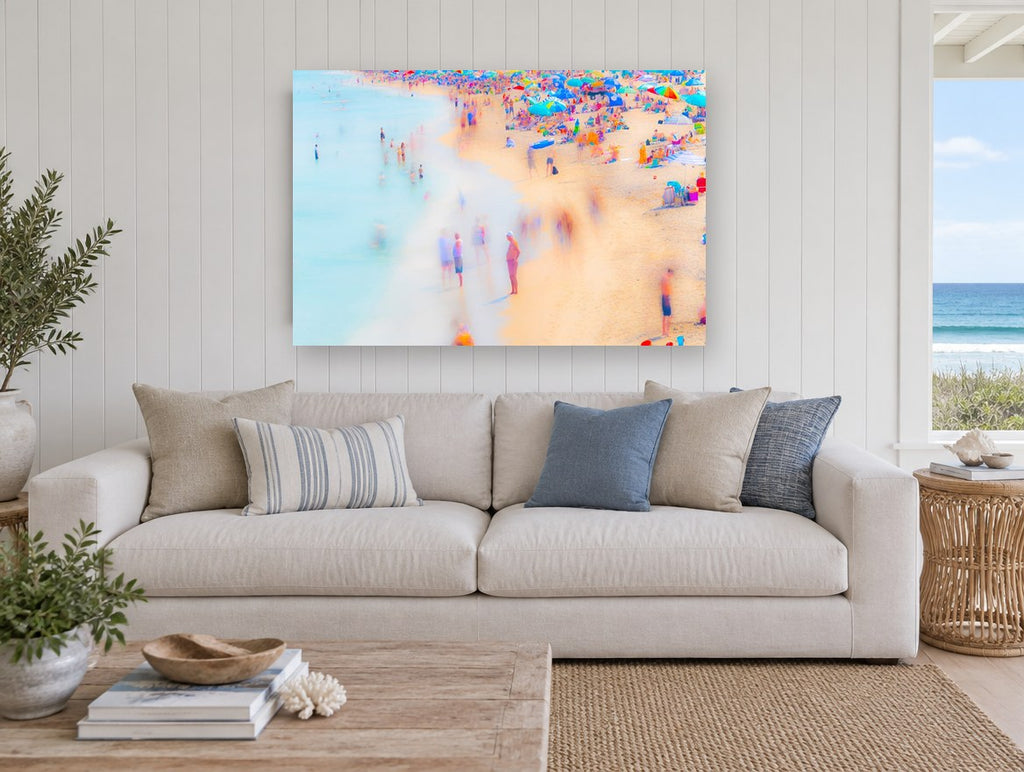 Crowded Summer Shoreline coastal canvas print on the wall of a beach house living room