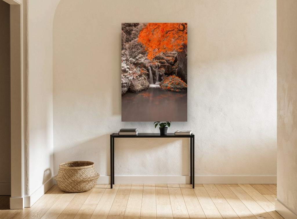 Orange Maple Waterfall floral canvas print on the wall of a hallway