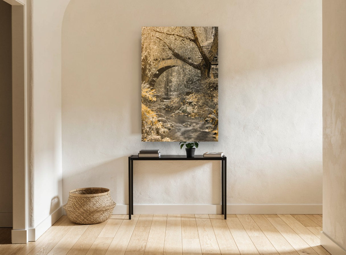 Golden Creek Bridge floral canvas print on the wall of a hallway