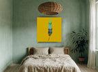 Dotted Teal Feather animal canvas print on the wall of a bedroom