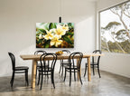 Golden Frangipani Branch floral canvas print on the wall of a dining room