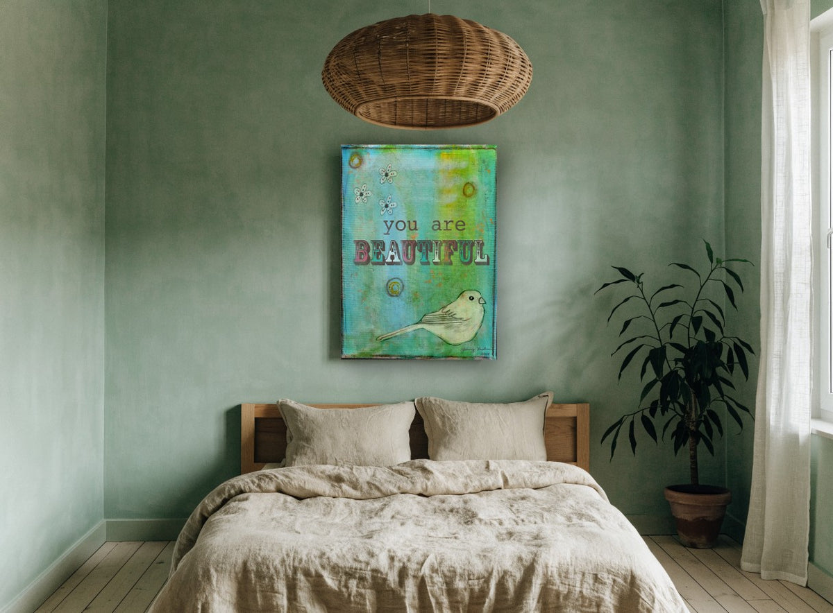Beautiful Bird Affirmation animal canvas print on the wall of a bedroom