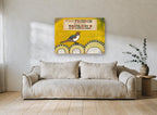 Bird Finding Freedom animal canvas print on the wall of a living room