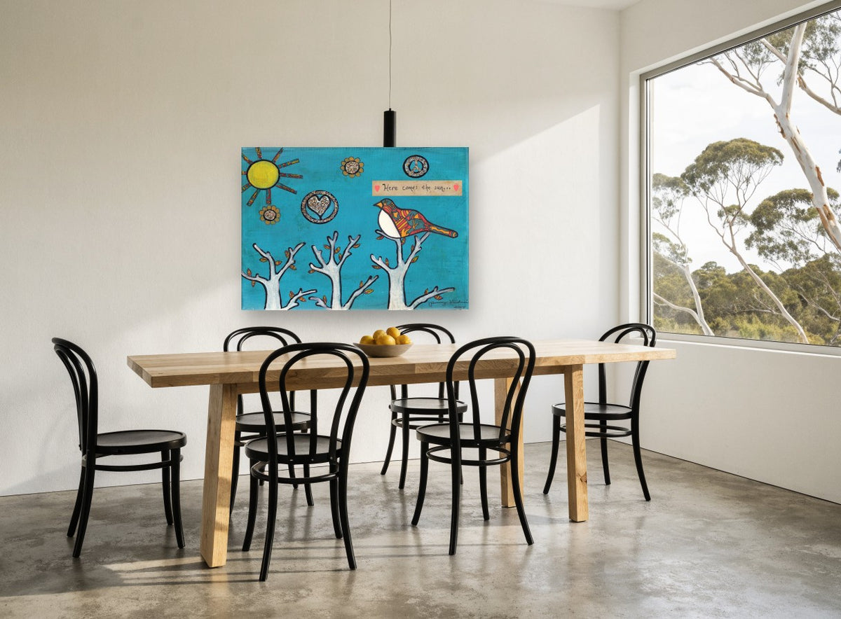 Bird Greeting the Sun animal canvas print on the wall of a dining room