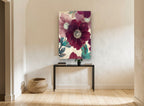 Burgundy Poppy Bloom floral canvas print on the wall of a hallway