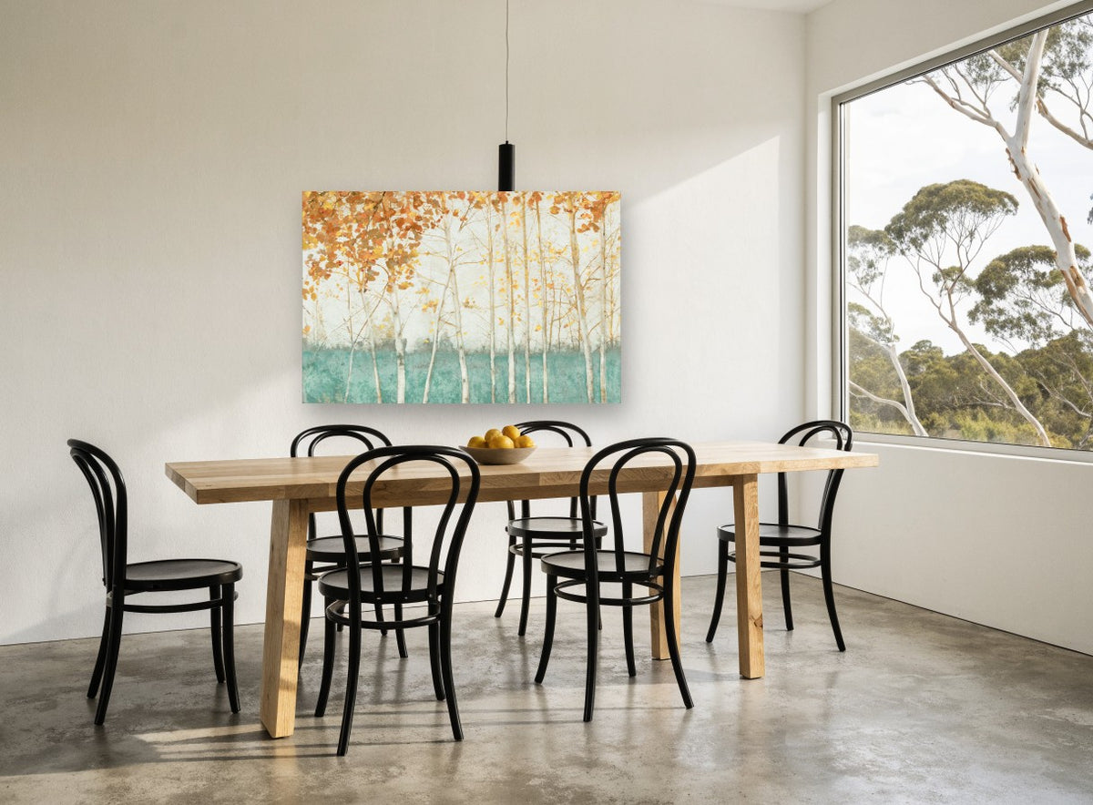 Teal Meadow Birches floral canvas print on the wall of a dining room
