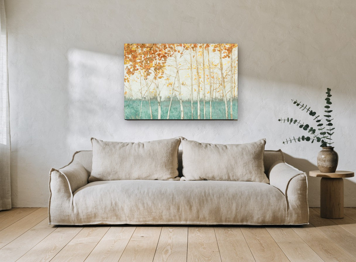 Teal Meadow Birches floral canvas print on the wall of a living room
