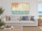Teal Meadow Birches floral canvas print on the wall of a beach house living room