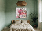 Blush Peony Bouquet floral canvas print on the wall of a bedroom