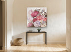 Blush Peony Bouquet floral canvas print on the wall of a hallway