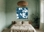 Indigo Leaf Silhouettes floral canvas print on the wall of a bedroom