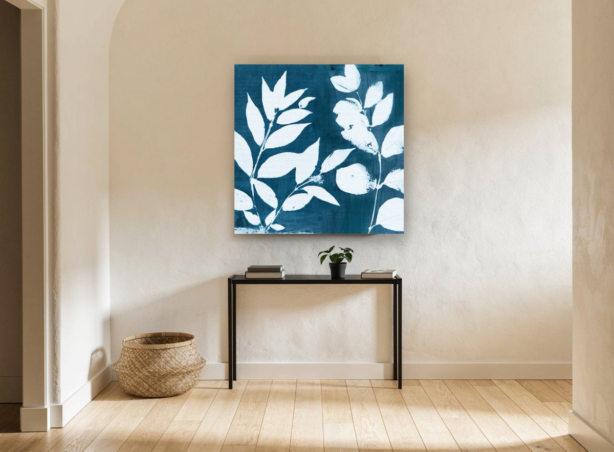 Indigo Leaf Silhouettes floral canvas print on the wall of a hallway